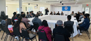 अस्टिनवासी समुदायसँग नेजाद्वारा अन्तरक्रिया